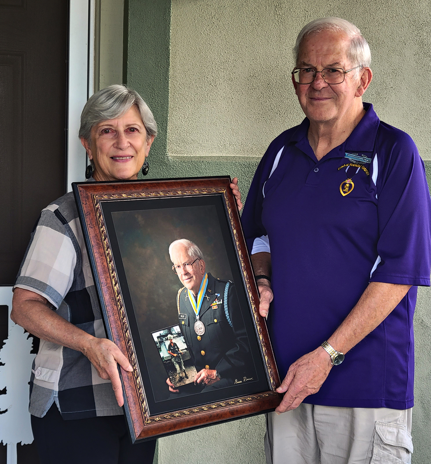 Vision of Vets Presents Capt. Charles Taylor with Portrait